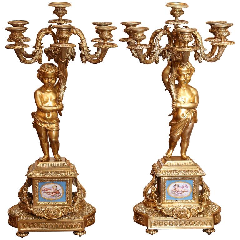 Pair of Gilt Bronze and Sevres Porcelain Candelabrum